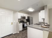 Thumbnail 7 of 22 - Apartment Kitchen at 55+ FountainGlen Seacliff, Huntington Beach, CA