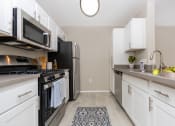 Thumbnail 1 of 22 - Apartment Kitchen at 55+ FountainGlen Seacliff, Huntington Beach, CA