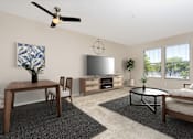 Thumbnail 4 of 33 - a living room with a ceiling fan and a flat screen tv at 55+ FountainGlen Temecula, California