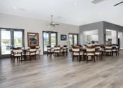 Thumbnail 20 of 34 - community clubhouse table and chairs at 55+ FountainGlen Valencia, Valencia, CA, 91354