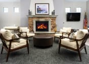 Thumbnail 18 of 34 - a room with furniture and a fireplace at 55+ FountainGlen Valencia, California, 91354