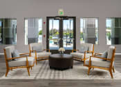 Thumbnail 22 of 34 - a lobby with chairs and a table in front of a door at 55+ FountainGlen Valencia, Valencia