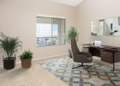 Thumbnail 6 of 34 - home office with desk chair and rug at 55+ FountainGlen Valencia, California