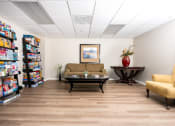 Thumbnail 33 of 34 - a living room with couches and a coffee table at 55+ FountainGlen Valencia, California, 91354