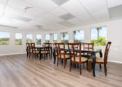Thumbnail 34 of 34 - community clubhouse with table and chairs at 55+ FountainGlen Valencia, Valencia, California