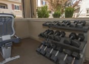 Thumbnail 14 of 46 - fitness center with dumbells