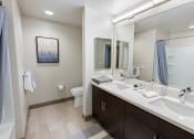 Thumbnail 80 of 83 - furnished bathroom with dual sinks at Bayswater Apartments, California