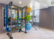 Thumbnail 25 of 83 - fitness center with exercise balls and yoga mats at Bayswater Apartments, Burlingame, CA