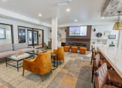 Thumbnail 20 of 83 - resident lounge with HD tv and lounge seating at Bayswater Apartments, Burlingame