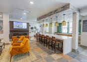 Thumbnail 19 of 83 - resident kitchen with lounge seating at Bayswater Apartments, Burlingame, CA