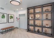 Thumbnail 42 of 83 - leasing lobby with decorative shelf at Bayswater Apartments, California