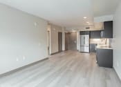 Thumbnail 47 of 83 - Living room and kitchen at Bayswater Apartments, Burlingame
