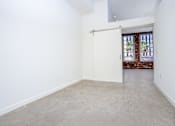 Thumbnail 16 of 68 - room with white walls and barn style sliding door at Imperial Hardware Lofts, California, 92501