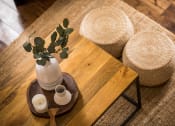 Thumbnail 22 of 72 - a table with a vase and candles on it