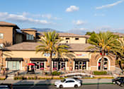 Thumbnail 77 of 80 - A building with a sign that says "Morgan Secrets" in front of it.