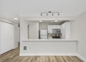 Thumbnail 43 of 73 - a kitchen with white cabinets and a white counter top at Lakemont Orchard, Issaquah, WA 98027  