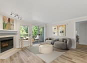 Thumbnail 28 of 73 - a living room with a large gray couch and a round coffee table at Lakemont Orchard, Washington, 98027