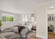 Thumbnail 30 of 73 - a bedroom with a bed and a closet at Lakemont Orchard, Issaquah, WA 98027  