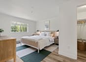 Thumbnail 57 of 73 - a bedroom with a bed and a dresser and a mirror at Lakemont Orchard, Issaquah  