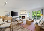 Thumbnail 67 of 73 - a living room with a fireplace and a television at Lakemont Orchard, Washington  
