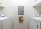 Thumbnail 27 of 84 - Washer and dryer in a laundry room at Level at Sixteenth, Phoenix, AZ