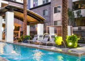 Thumbnail 79 of 84 - Swimming pool with a fountain and lounge chairs at Level at Sixteenth, Arizona