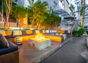 Thumbnail 80 of 84 - Patio with couches and a fire pit at Level at Sixteenth, Phoenix