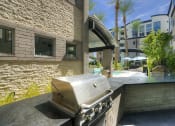 Thumbnail 9 of 84 - BBQ grills and outdoor island kitchen at Level at Sixteenth, Phoenix, AZ