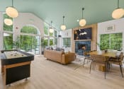 Thumbnail 3 of 73 - clubroom with a fireplace and a pool table at Lakemont Orchard, Issaquah Washington  