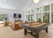 Thumbnail 6 of 73 - a pool table in the clubroom with windows at Lakemont Orchard, Issaquah  