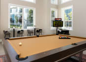 Thumbnail 2 of 78 - a pool table at the district flats apartments at Miro at the Parc, Henderson, Nevada
