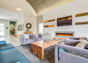 Thumbnail 30 of 36 - Clubroom with fireplace and TV at Montrachet Apartments, Napa, CA, 94558