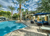 Thumbnail 34 of 67 - Pool with lounge area