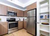 Thumbnail 7 of 67 - Kitchen with stainless steel appliances at Monument, Arizona