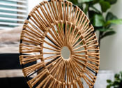 Thumbnail 29 of 67 - a decorative brass fan sculpture on a table