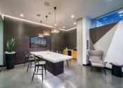 Thumbnail 14 of 24 - club house with seating at NoMa Apartments, California, 94596