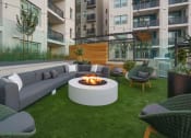Thumbnail 6 of 24 - Outdoor Community Lounge With Firepit, Chairs, Tables, And Maintained Landscaping In the Heart Of The Apartment Building. at NoMa Apartments, Walnut Creek, 94596
