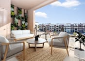 Thumbnail 1 of 52 - A living room with a couch, chair, and table with a view of a cityscape.