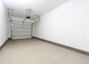 Thumbnail 46 of 93 - A Garage With a White Wall at North Grove, California