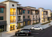 Thumbnail 82 of 93 - A Row Of Townhouses With Cars Parked In Front at North Grove, Riverside, 92501