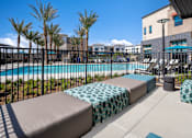 Thumbnail 66 of 93 - Poolside Lounge Area at North Grove, Riverside