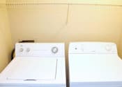 Thumbnail 15 of 39 - Two white washing machines at Avalon at Seven Hills Apartments, Nevada