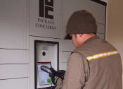 Thumbnail 6 of 59 - Package concierge at The Preston Miracle Mile Apartments, Los Angeles, CA