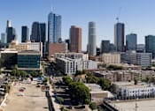 Thumbnail 20 of 26 - A cityscape with tall buildings and a clear sky at Wilshire Valencia Apartment, Los Angeles, 90017