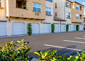 Thumbnail 72 of 123 - an empty parking lot in front of an apartment building