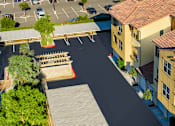 Thumbnail 102 of 123 - an aerial view of an empty parking lot with houses