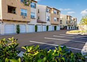 Thumbnail 77 of 123 - an empty parking lot in front of an apartment building