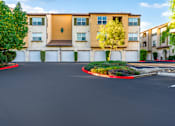 Thumbnail 108 of 123 - an empty parking lot in front of an apartment building