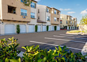 Thumbnail 110 of 123 - an empty parking lot in front of an apartment building