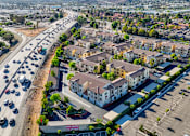 Thumbnail 117 of 123 - an aerial view of a city with cars on the street and buildings